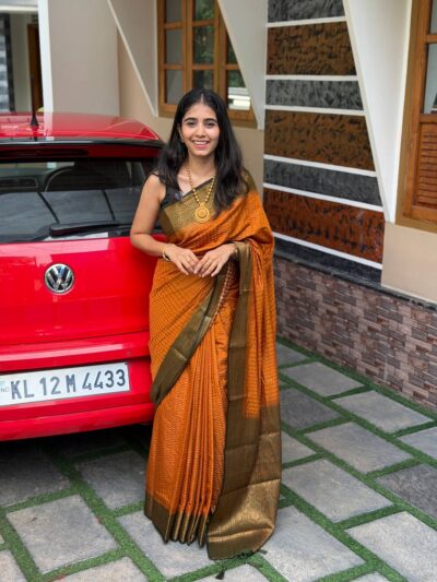 ARCHANA ORANGE:SEMI BANARASI SAREE